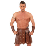 Man wearing the brown gladiator skirt and armbands
