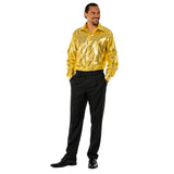 Adult wearing gold disco shirt with black trousers and classic 70s disco fashion