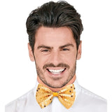 Man wearing a yellow sequin bow tie on a white background
