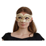 
Woman wearing the cream and gold masquerade mask