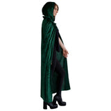 Side view of green velvet hooded cape on female model