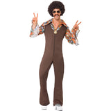 Person wearing a brown bell-bottom jumpsuit with a colorful shirt, sunglasses, and afro wig on a white background.