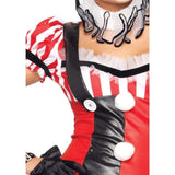 Close-up of harlequin clown bodice with pom-pom accents and ruffle trim