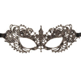 Decorative mask with intricate designs on a white background