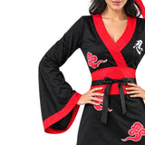 Close-up of wide sleeve and red trim on ladies ninja costume