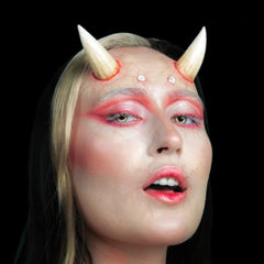 Large devil horns made from Black Label Latex with realistic texture for Halloween costumes