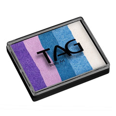 A rectangular makeup palette with five vertical stripes of pearl face paint in purple, light purple lilac, blue, light blue, and white, enclosed in a black frame.