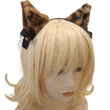 Blonde wig with leopard ears and a bow on a white background