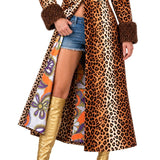 Close-up of leopard print ladies jacket hem and velvet fabric detail