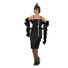 1920s long black flapper dress with fringe, gloves, and headband
