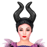 Person wearing a black horned headpiece with a white background