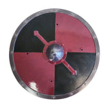 Round shield with red and black design on a white background