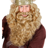 Person wearing a blonde wig and beard with a viking helmet on a white background