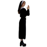 person weaing a black dress and headpiece for a nun halloween costume