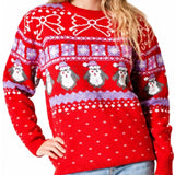 Close-up of ladies penguin Christmas jumper featuring festive Fair Isle knit pattern with penguins and snowflakes