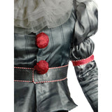 Close up of Pennywise costume satin bodice with red pom poms striped sleeves and ruffled collar