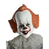 Close up of Pennywise IT Chapter 2 costume mask with painted features and attached red hair