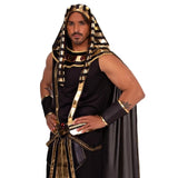 A man modeling an ancient Egyptian pharaoh costume against a plain white background. The costume features a black tunic and draped cape with prominent gold striped details, a matching headpiece, and black arm bands with gold trim.