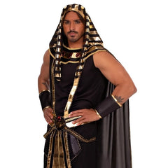 person modelling egyptian pharaoh style costume in black and gold on a white background