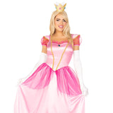 Person wearing a pink princess costume with a crown on a white background