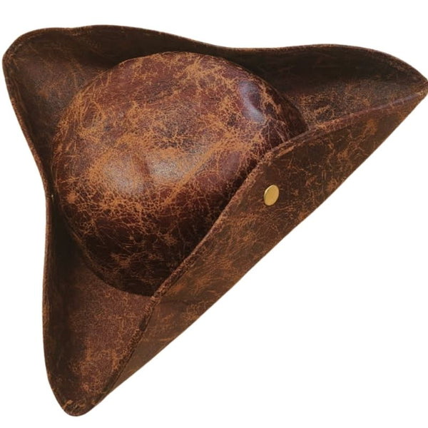 Brown leather tricorn hat with a gold button on a white background