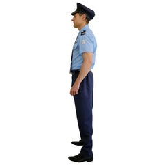 A man modeling a police officer costume set consisting of a light blue short-sleeve shirt, navy blue trousers, a dark navy tie, a navy blue cap, and a toy gun accessory, against a plain white background.