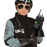 Child wearing toy police radio prop