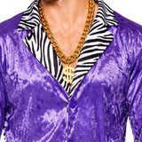 Close-up of purple pimp suit showing zebra print collar, gold chain and velour-look fabric