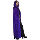 Side view of purple velvet hooded cape on female