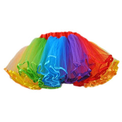 Adult rainbow tutu skirt with satin trim and layered tulle – perfect for Pride or costume parties.