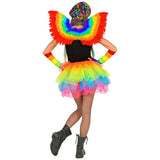 Person wearing a colorful rainbow costume with wings on a white background