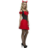 Woman wearing a red and black dress with devil horns on a white background