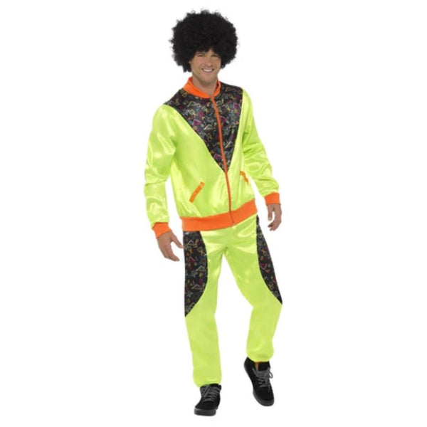 Green 80s shell suit with geometric black and orange panels