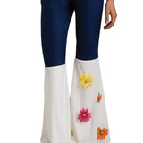 Rockstar Gal Costume - Adult, white fringed top, blue flares with white flare emblellished with daisies.