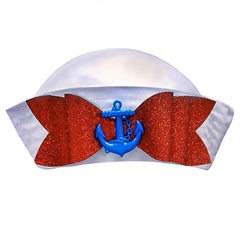 White sailor gob hat with glitter red bow and blue anchor