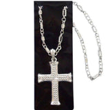 Silver cross necklace on decorative chain.