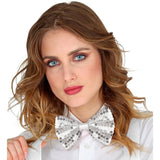 Woman wearing a white shirt with a decorative bow collar against a white background