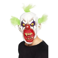 Sinister Clown Mask in latex with scary face and tuffs of green hair.