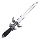 Silver 62cm skeleton villain costume dagger with ornate skull guard and black handle
