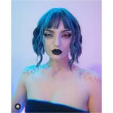 Brilliant blue cosmetic contact lenses – yearly wear for cosplay and costumes worn by model.