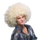 Male model wearing a super afro blonde wig with thick curly disco-inspired hairstyle