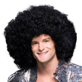 Super Black Afro Wig – adult-sized unisex wig with thick, curly polypropylene strands styled in a classic afro shape. worn by a male