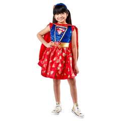 Child wearing an officially licensed Supergirl Premium costume with cape and headband
