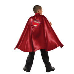 Child wearing official DC Comics Superman deluxe cape with embroidered logo