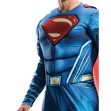 Close up of muscle chest for Superman Deluxe Adult Costume, detachable red cape.
