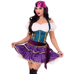 Woman wearing a costume with a purple skirt, teal top, and white accents on a white background