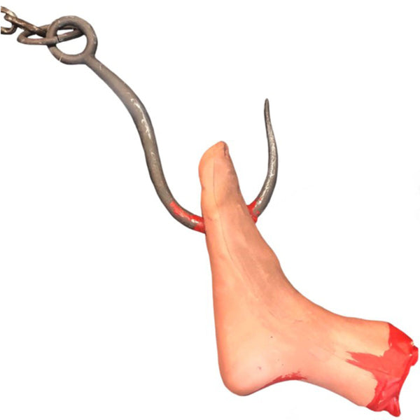 The Butchery severed foot Halloween prop hanging from a meat hook for haunted house and horror decorations