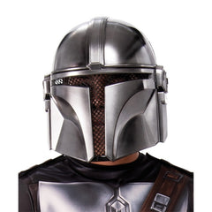 The Mandalorian Classic Child Costume – digitally printed jumpsuit with armour, bandolier, belt, and chest plate details, removable Velcro cape, and moulded half-face mask with vision holes and elastic strap.