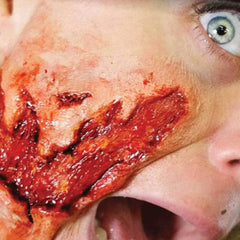 Tinsley 3d fx transfer of ripped flesh, one large gash.