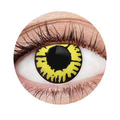 Close-up of a colored contact lens with yellow and black design